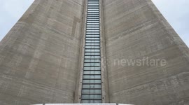 Close up vertical panning shot from the base to the top of the Toronto CN Tower