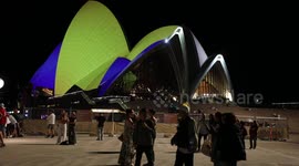 Sydney Opera House is lit up on first anniversary of the invasion of Ukraine, Sydney, Australia