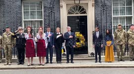 UK Prime Minister Rishi Sunak and Ukrainian Ambassador to the UK Vadym Prystaiko observe one-minute silence