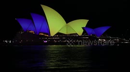 Sydney Opera House is lit up on first anniversary of the invasion of Ukraine, Sydney, Australia