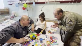 Heartwarming clip shows 4-year-old Turkish earthquake survivor who lost arm in good spirit as she gets gift from military visitors