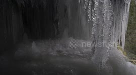 Naturally forming ice balls below a frozen waterfall near Hope BC amidst a cold weather event