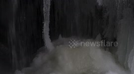 Naturally forming ice balls below a frozen waterfall near Hope BC amidst a cold weather event