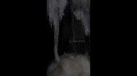 Naturally forming ice balls below a frozen waterfall near Hope BC amidst a cold weather event