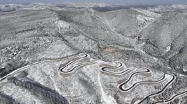 Winding Road After Snow In Qingzhou, China