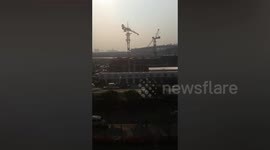 Crane collapses killing one person next to shopping mall in Bangkok