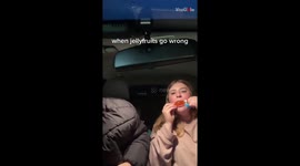 Jovial girl CAN'T STOP LAUGHING after accidentally splattering BFF with juicy fruit jelly