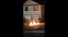 Closer view of Daly City home gas main fire continuous burning as fire crews wait for PG&E to establish a plan to put out fire.