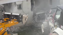 Israeli bulldozers demolish a Palestinian-owned house near Jerusalem for lacking permit