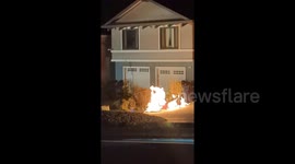 Close-up view of Daly City home still burning from leaking gas main as California homes evacuated