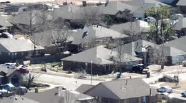 Aerial footage shows significant damage in Norman, Oklahoma after tornado touchdown