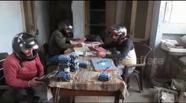 Employees in India wear helmets indoors due to concerns over deteriorating office roof
