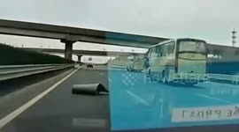 Ice-cool driver safely pulls over after opaque sheet blocks windscreen