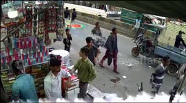 Passersby cower as rickshaw carrying firecrackers explodes in northern India