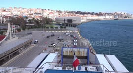 Cars, caravans, camper vans and trucks boarding a ferry in Santander, Spain, winter 2023.