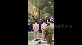 Sister of Yaniv brothers gives speech a their funeral in Jerusalem, Israel