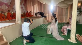 Hilarious moment unruly pet husky disrupts couple's solemn Buddhist wedding rituals