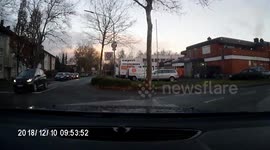 Close Call: Opel Ignores Stop Sign as Vehicle Tries to Take a Left Turn