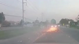 Dash cam shows overloaded truck catching fire on road