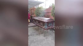Undertaker turns old coffin into DIY home barbecue grill