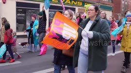 Teachers Wave Flags And blows Whistles During March In Bristol