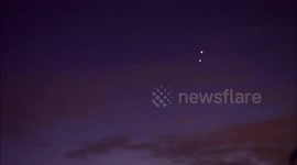 Planets Jupiter and Venus appear to 'kiss' in night sky above Kent, UK