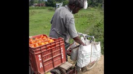 the old man vegetable selling in the Bicycle in India . delay life