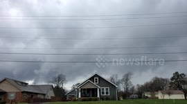 Tornado causes damage near Paducah, Kentucky as residents take cover in basements