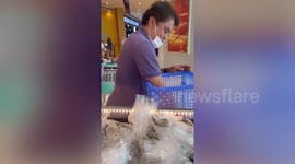 Amusing scene shows bags of coins used by laundromat owner to buy gold rings