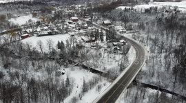 Stock Footage of Cars Driving In Snowy Rural Area