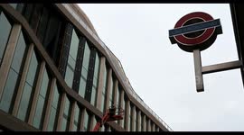 Man within a crane working on the upcoming Google Headquarters within London, United Kingdom