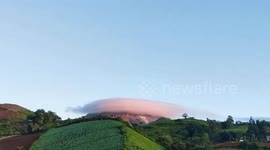 Spectacular 'halo of clouds' sits atop volcano in the Philippines