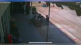 Dust devil tornado rips through patio as friends have drinking party