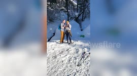 Couple reveal chaotic mountain proposal which included a moose charge and a momentary ring loss