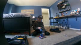 *Bottle flip challenge* Boy manages to make incredible quintuple tower by flip-landing bottles