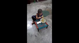 Cute little girl eating Maggi noodles in Odisha . cute baby girl watching cartoon video on mobile and eating Maggi