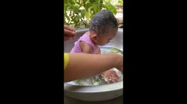 A cute baby in the bath