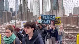 Fridays For Future procession at the Brooklyn Bridge in New York, USA