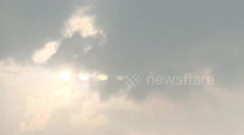 Rare phenomenon sees FOUR suns appear in sky above Chinese city