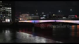 Double Decker Buses Driving Across The London Bridge In The Evening, London, United Kingdom