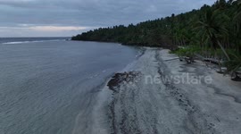 Drone captures Philippines beach covered in oil after tanker spill
