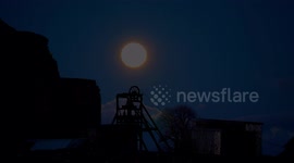 Stunning sunset & full worm moon rising over Magpie Mine in The Peak District National Park Derbyshire UK - Video & Time-Lapse Mix 4K editorial edit