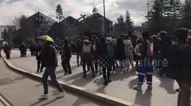 People dance in front of the police at the protest in Nantes, France