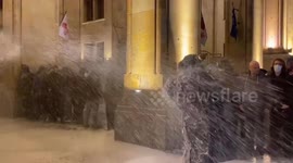 Georgia: Riot Police Use Water Cannons, Tear Gas On Protesters Outside Parliament In Tbilisi 5