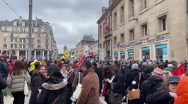 People protest against pension reform in Caen, France