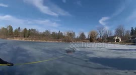 Man And His Dog Pulled Out Of Frozen Pond In Raymond, WI, USA