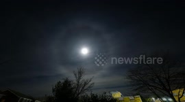 Full moon, Worm Moon, Lantern Moon Timelapse showing a halo created by the light interacting with ice crystals high in the atmosphere.