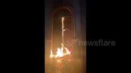 Government palace doors set alight during International Women's Day rally in Mexico