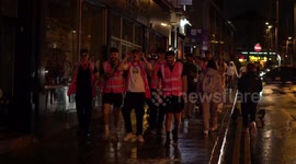 Brave students hit bars despite snow and frigid temperatures in Nottingham, England