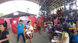 Displaced families stay in tents at relief centre following earthquake in the Philippines